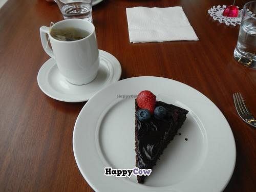 Healthy (spelt and agave I think?) vegan chocolate cake with some hot tea at Silva in Eyjafjardarsveit