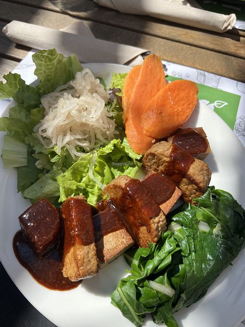 Mega protein plate - tempeh and smoked tofu in bbq sauce with boiled sweet potatoes, steamed greens and pickled cabbage  at Zrno Bio Bistro in Zagreb