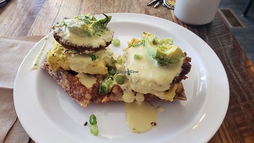 Benedict Latkes! (fried potato cake topped with tofu egg, vegan hollandaise sauce, sausage patty, avocado. at Lulu's Local Eatery in St Louis