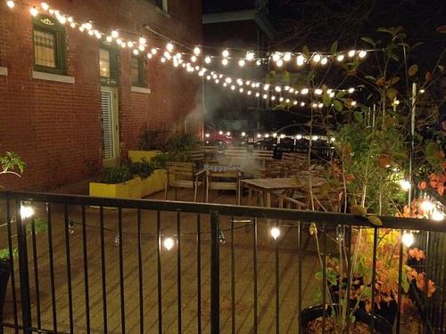 pretty, cozy, quaint outside patio area w/ fire pit at Lulu's Local Eatery in St Louis