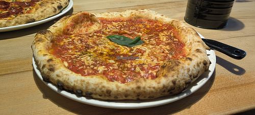 Vegan pizza with vegan cheese at Gasta Port Righ - Isle of Skye Candle Co Visitor Centre in Portree