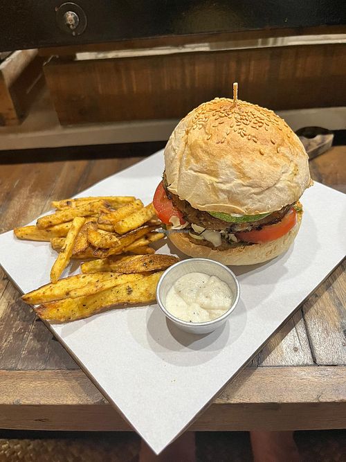 vegan burger with home made fries  at Full Lotus Mindful Kitchen in Coron