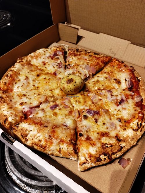 Medium 2 topping (garlic and onion) pizza with vegan cheese at Jim's Pizzeria - Sardis in Chilliwack