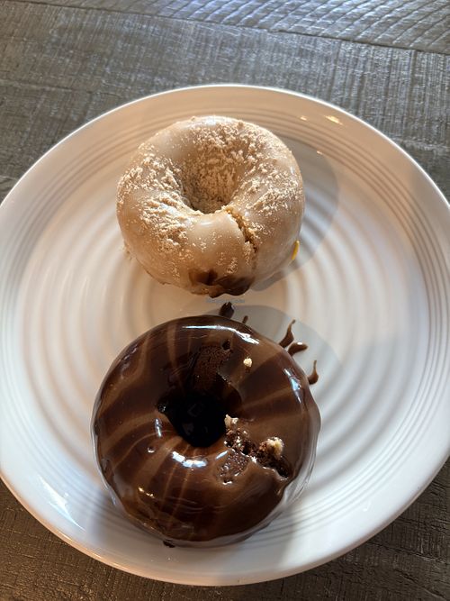 French toast donut and chocolate donut   at Parlor Doughnuts in Panama City Beach