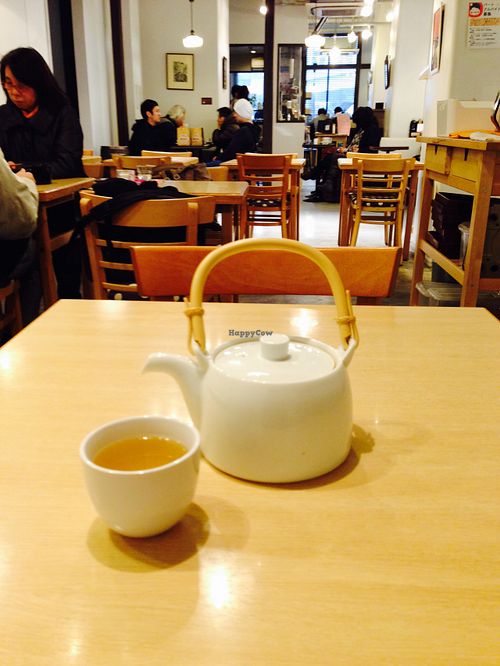 Enoying some quiet time in busy Akihabara with some ginger tea at Komaki Shokudo in Tokyo