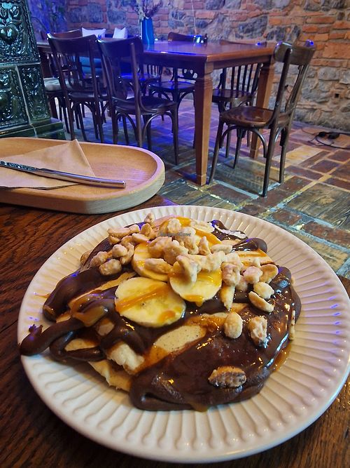 Winter pancakes, with choco peanuts, not my thing at Piccola Cafe in Ljubljana
