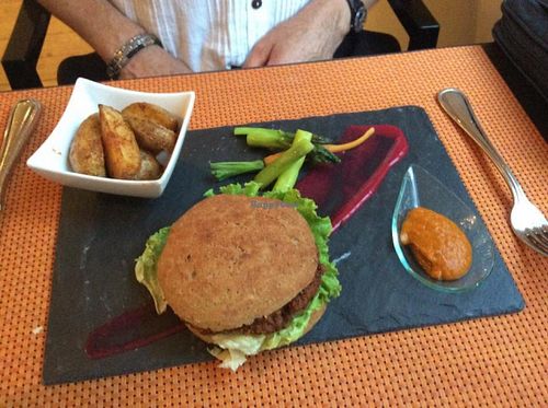 Helvegs spicy burger......  at Helveg Cafe in Geneva