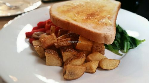 English breakfast: toast, mushrooms, tomato, roasted potatoes, spinach and bell pepper at Lounges - Loco Lounge in Birmingham