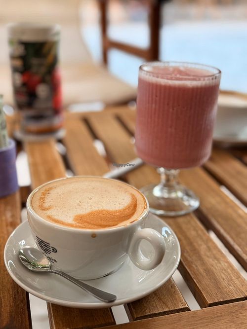 Cappuccino (Choice: Oat, Soy, Coco, Almond) and Milkshake (Strawberry or Chocolate)  at Arkateno in Omodos