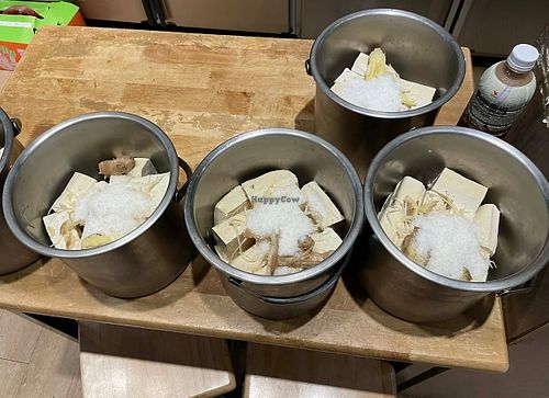 pots of tofu being prepped for cooking at Miao Guanyin - 妙觀音素食 - Zhongzheng District in Taipei