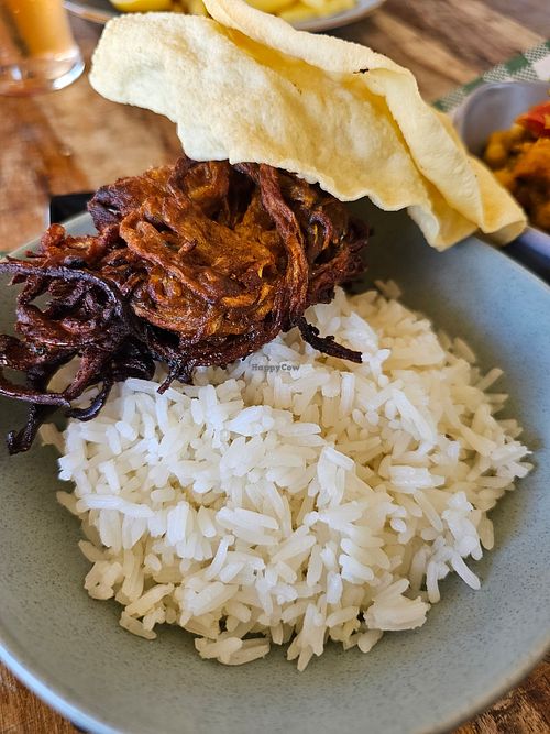 Rice & onion bhajis (feat. papadums in the back) at The Cornerstone Ale House in Butler