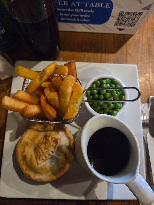 notdog pie with chips,  peas,  and gravy at The Happy Cheese in Ashurst