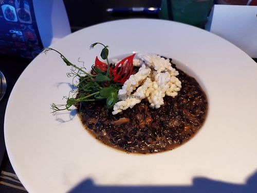 Vegan risotto with black rice and mushrooms at Wonderland Ljubljana in Ljubljana