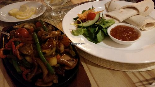 Mixed Vegetable Tikka Sizzler with tortilla wrap, mango chutney and salad at Playwrights in Coventry