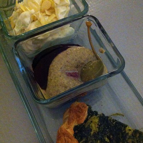 appetiser selection: celery, apple and almond salad with mayo; beet root with bagna cauda sauce; chicory and vegan ricotta tart at Ratatouille in Turin