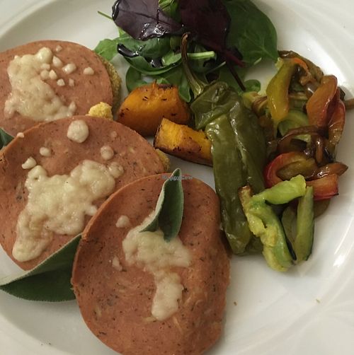 lupinseed steaks with vegan ham and cheese, baked pumpkin, and bell peppers at Ratatouille in Turin