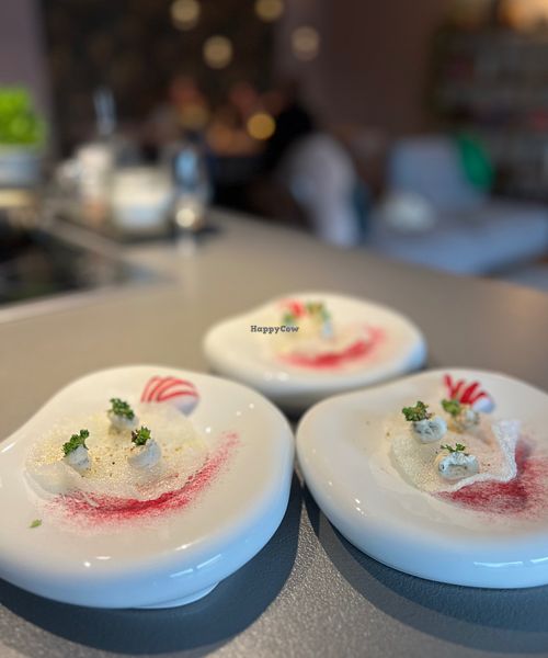 Amuse Bouche- vegan sago crips | vegan wasabi cream | pink pataya powder
 at à Table Chez Anou in Geneva
