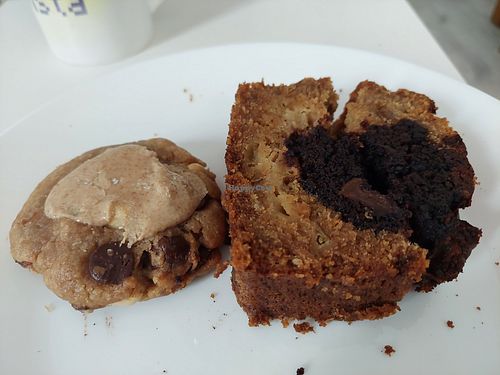 Vegan cookie and vegan chocolate sponge cake (the.latter wasn't labelled, so ask the staff) at Novo Mundo in Madrid