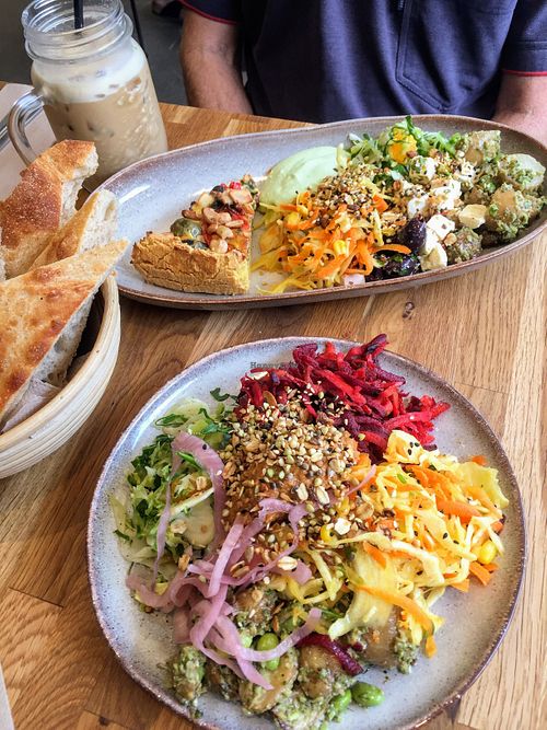 Small serving ..  4 salads (vegan), hommus, seeds. at Fika in Aarhus