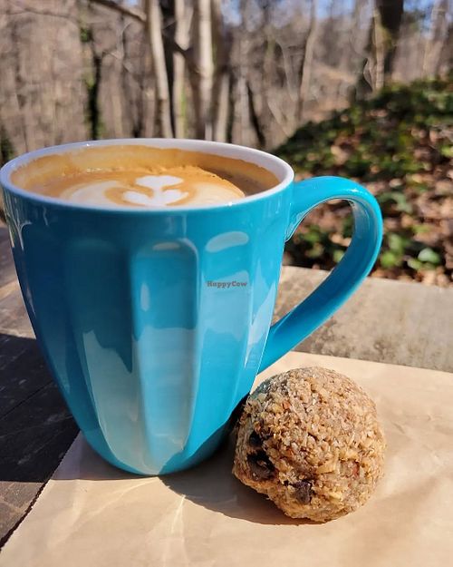 Latte w/ nondairy milk and banana coconut chocolate macaron (vegan + gf) at Caffé Driade in Chapel Hill