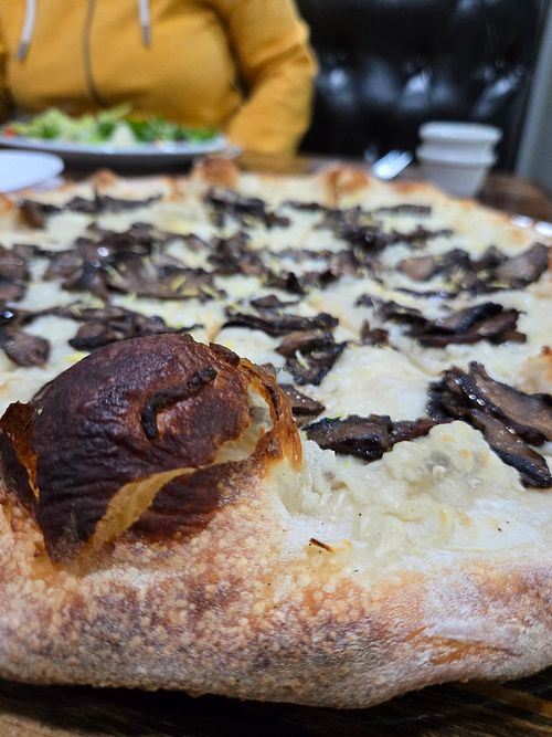 Onion, lemon, olive oil, mushroom and vegan cheese white pizza. at Brooklyn Heights in Sandwich