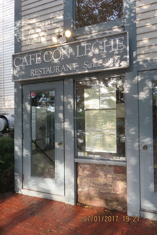 storefront from parking lot in back at Cafe Con Leche in Newtown