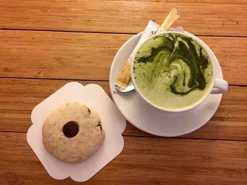 The popular vegan and gluten-free coconut-chocolate cookie & matcha soy latte. at Green Bear Coffee - La Canebiere in Marseille