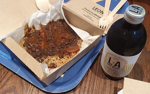 Black bean chilli rice pot and ginger kombucha at LEON - Euston Rd in London