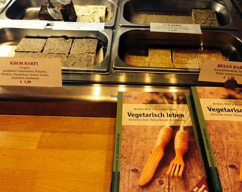 sweets at the counter & books for sale at Govardhan in Cologne