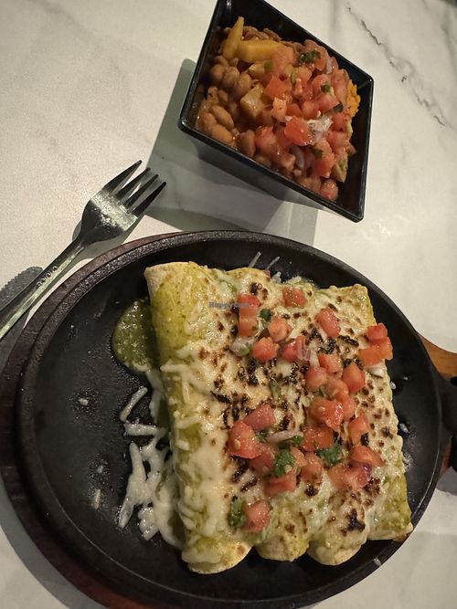 Vegan enchiladas with the world’s best rice and beans   at B-UNOS  in Florence