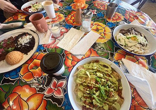 Vegan chilaquiles in bottom plate! Delicious!!!   at Cochinita & Co in Houston