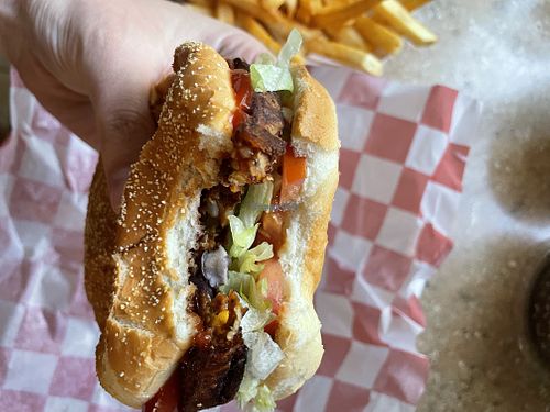 Black bean burger without mayo the patty is vegan and comes with lettuce, tomato, and the bun.   at Burgertown Dairy Freeze in Bigfork