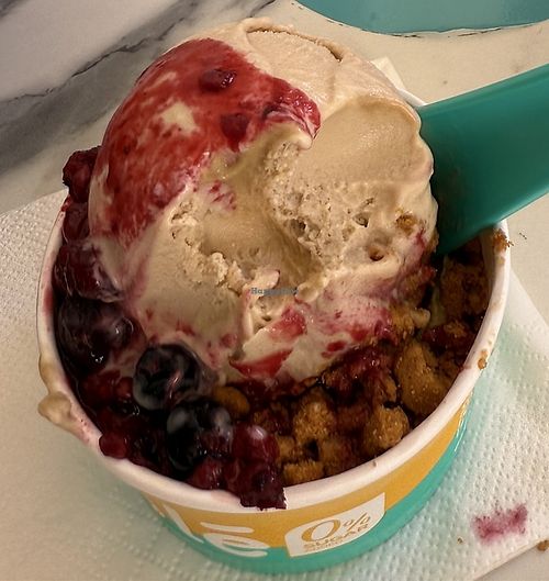 Peanut butter ice-cream on top, pistachio hiding at the bottom, caramelised biscuit crunch and a berry fruit coulis - it’s still settling as I write!  at Yole in Valletta
