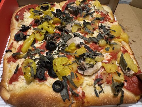 10” Vegan grandma pizza with half olives/banana peppers and half mushrooms/pineapple with thin julienned slices of fresh basil on top. (The basil gave a really nice pop of flavor at Genova Pizza in Audubon
