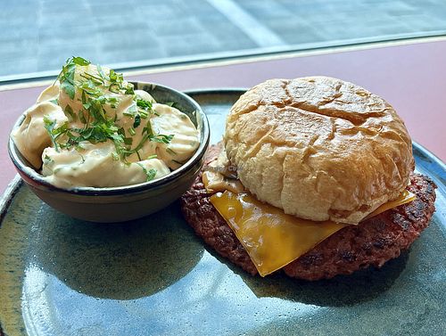 Vegan burger with potato saladd  at Table Dot “Urban Canteen” in Hamburg