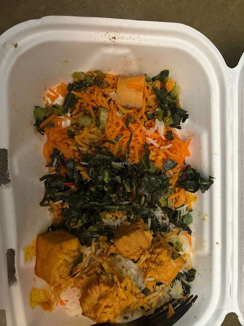 Leftover—collards, tofu curry, and African dirt rice (I never remember to take a pic before digging in).  at Chef Safari's African Fusion in Durango