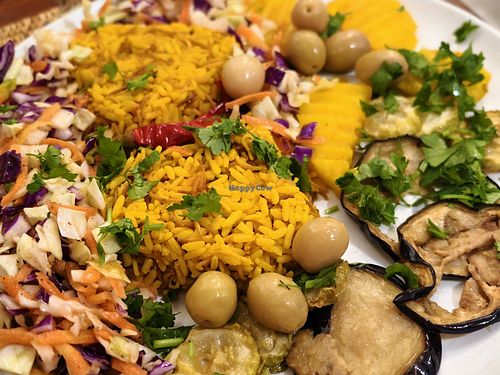 Off-menu vegan dish of rice, salad, and a few roast vegetables at Restaurant du Peuple in Sousse