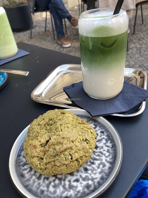 Matcha macadamia vegan cookie & oat milk matcha latte  at Der Keks in Berlin