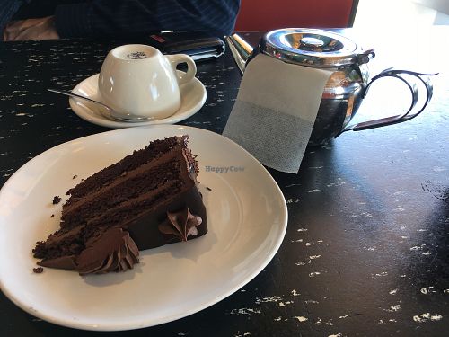vegan double chocolate cake and pot of chai tea. So yummy!  at Flying Star - Central Ave SE in Albuquerque