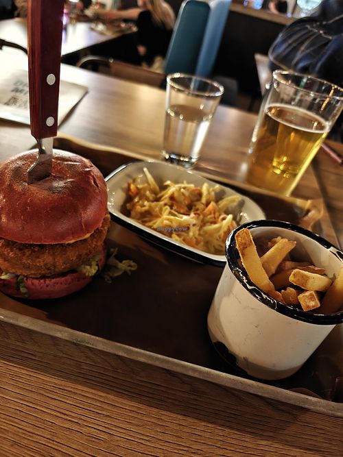 Mockmeat chicken tindle burger with beetrootbread and a coleslaw and fries on the side, good beer as well at BrewDog in Malmo
