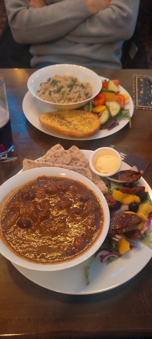 Olive and mushroom stifado (in front) and mushroom creamy pasta at The Travellers Inn in Sheffield