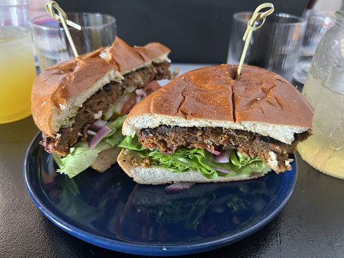 Homemade Vegan Patty made with mushrooms and roasted red peppers, and homemade vegan avocado yogurt saucee  at The Patio  in Providence