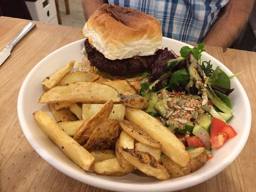 Burger, salad and chips. at Black Cat in East London