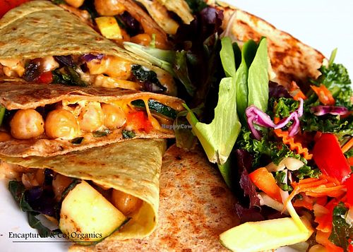 Happy Meatless Monday! I'm enjoying a Veggie & Bean Quesadilla! Grilled, Spiced, Organic Veggies, Garbanzo Beans, Chipotle Aioli, Cheddar and Mozzarella Cheeses on both a 7 Grain Flax and Spinach Tortilla!  at Sprouts Cafe in Gastonia
