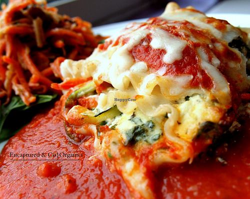 Vegetarian, Gluten Free Tinkyáda Rice Pasta Lasagna Rolls filled with Organic Carrots, Zucchini, Mozzarella, Romano, and Ricotta Cheeses, Kale and a homemade Marinara Sauce!  at Sprouts Cafe in Gastonia