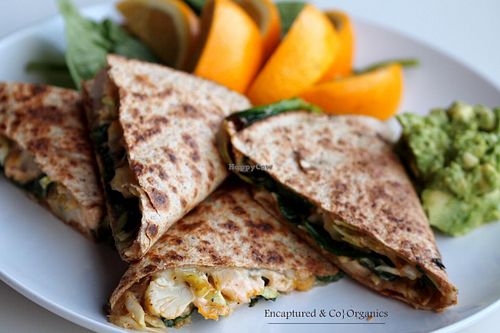 Veggie Quesadilla with spiced, grilled veggies on a 7-grain flax wrap with Melted Pepper-jack Cheese, Chipotle Aioli, and Organic Mashed Avocado!  at Sprouts Cafe in Gastonia