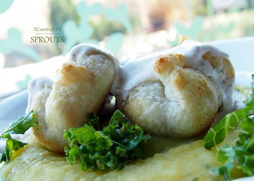 Veggie Dumplings over Creamy White Sweet Potatoes with Turnips topped with Herbed Whipped Cream!  at Sprouts Cafe in Gastonia