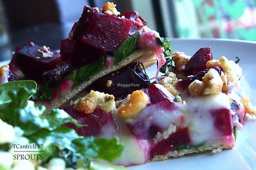 Roasted Beet, Arugula & Three-Cheese Pizza! Sprouts personal size pizza with a light sprinkle of Blue, Muenster, and Mozzarella Cheeses with Organic Roasted Beets, and Fresh Arugula finished with toasted Walnuts!  at Sprouts Cafe in Gastonia