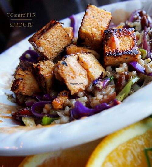 Tofu Veggie Stir Fry with Brown Rice, Peanuts, & Coconut Lime Sauce with a variety of Organic Veggies, Brown Rice, and softened with Seasoned Peanuts and Finished with a Lite Drizzle of Coconut Lime Sauce. at Sprouts Cafe in Gastonia
