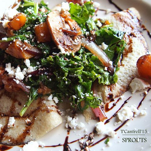  Savory Crepes with Sautéed Kale, Crimini Mushrooms, Butternut Squash, and Red Onion finished with a Sprinkle of Feta Cheese and Drizzle of Balsamic Reduction at Sprouts Cafe in Gastonia